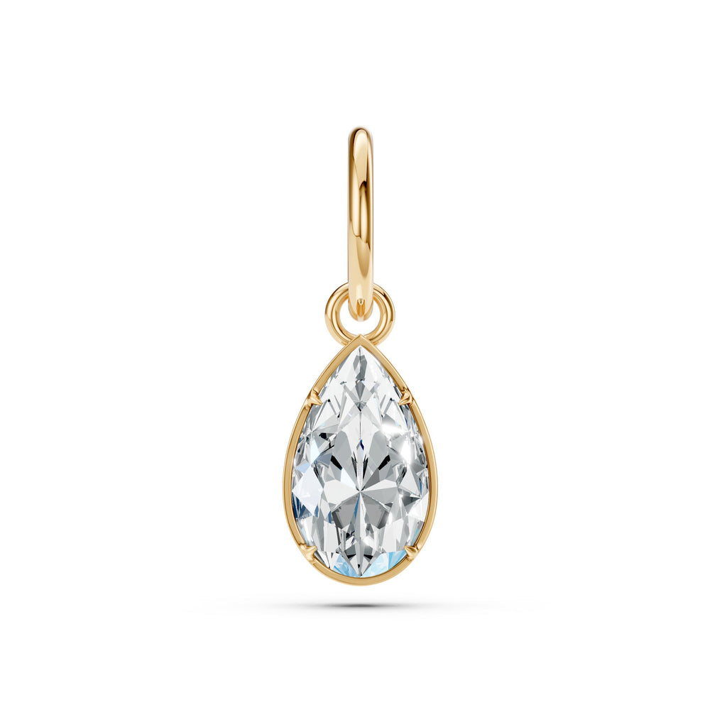 Gold pendant with a clear teardrop-shaped gemstone on a white background